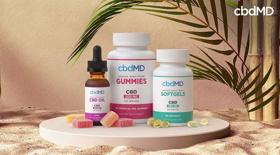 Broad spectrum cbd oil 200 mg cbd per serving berry gummies 200 mg cbd per serving tropical mix and softgels 200 mg cbd per serving next to each other with cbd gummies and cbd softgels in front of them - cbdMD