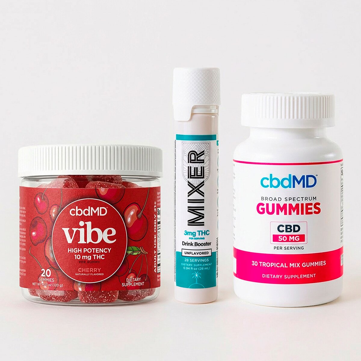Three cbdMD products including gummies, a mixer, and a jar on a white background